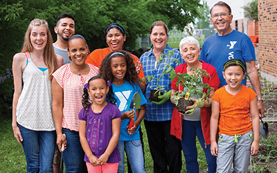 A group of the YMCA community smiling